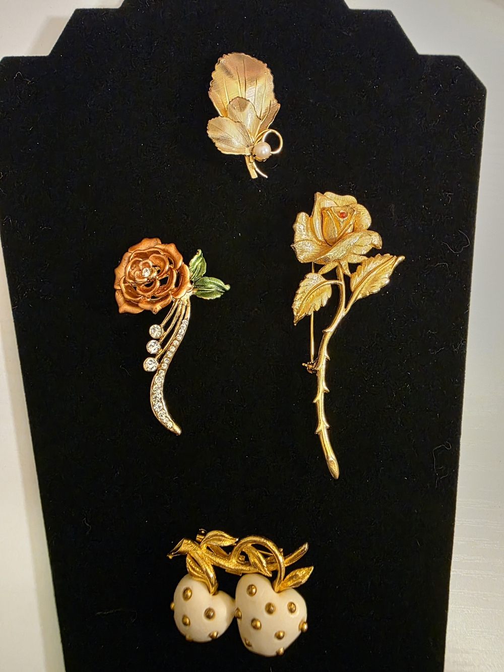 Lot Of Gold-Tone Floral And Fruit Brooches